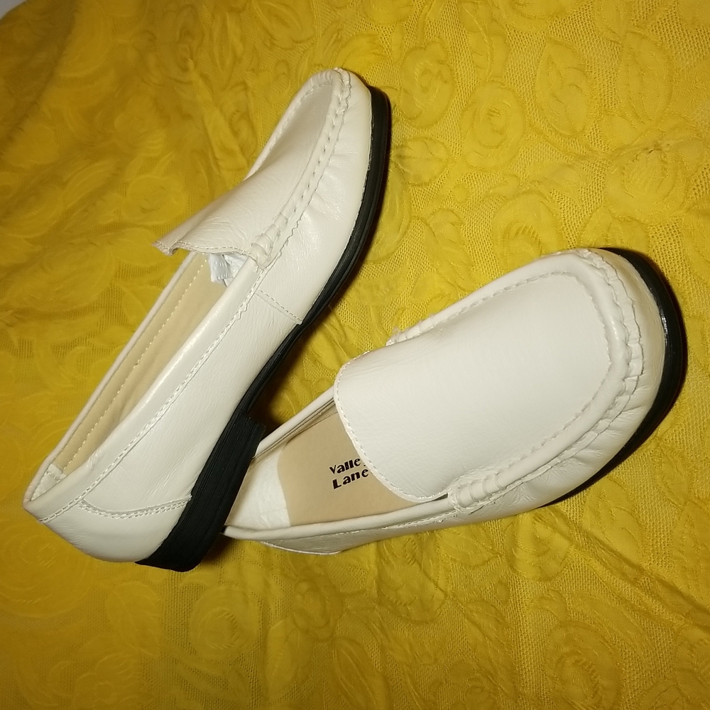 White leather Women's loafers.
